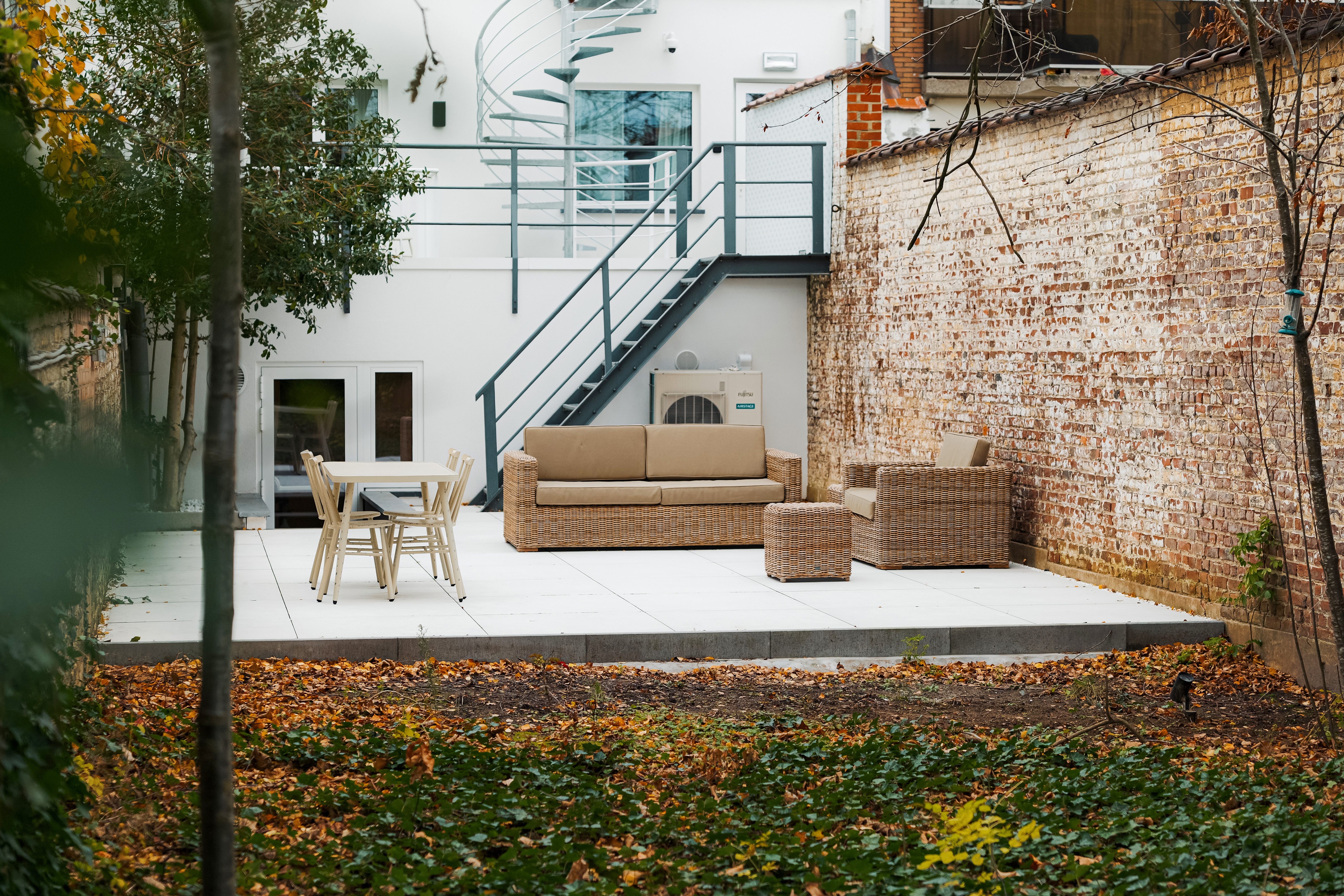 Jardín urbano detrás del apartahotel Whitlock16 en Bruselas